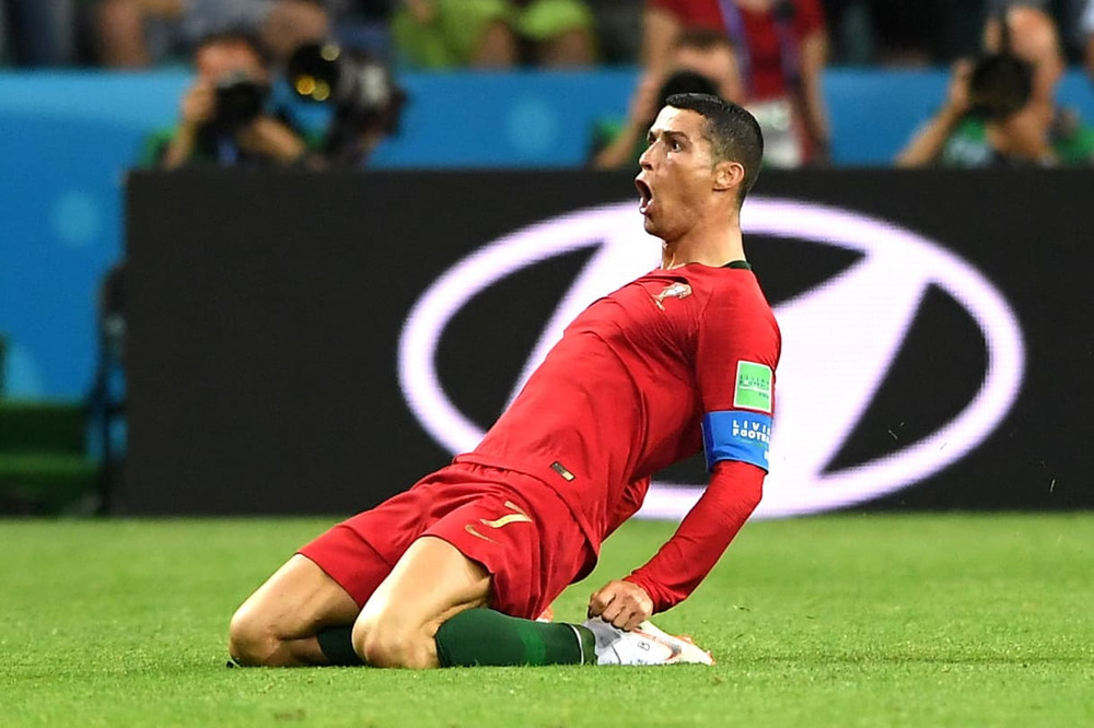 Ronaldo ăn mừng bàn thắng vào lưới Tây Ban Nha tại World Cup 2018
